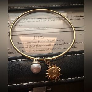 Coach Gold Bracelet with Sun and Pearl Charms